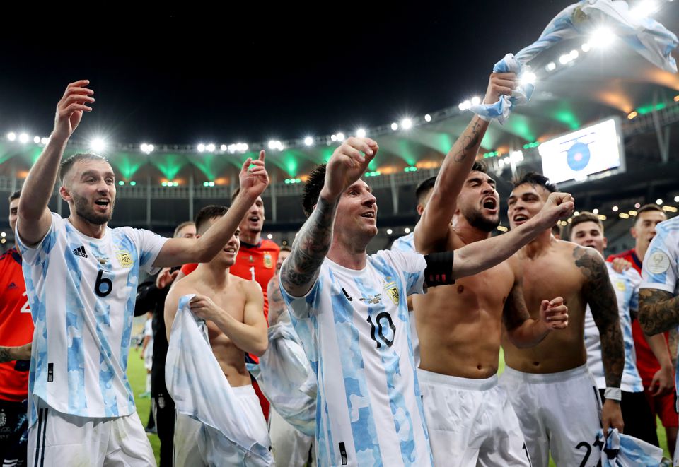 Soccer Football - Copa America 2021 - Final - Brazil v Argentina - Estadio Maracana, Rio de Janeiro, Brazil - July 10, 2021 Argentina's Lionel Messi celebrates with teammates after winning the Copa America. Photo: Reuters
