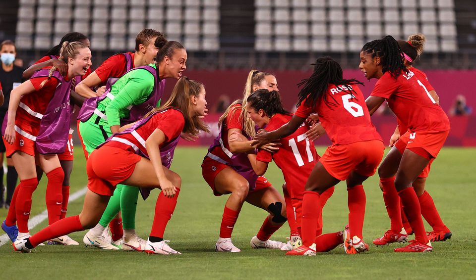 Tokyo 2020 Olympics - Soccer Football - Women - Semifinal - United States v Canada - Ibaraki Kashima Stadium, Ibaraki, Japan - August 2, 2021. Jessie Fleming of Canada celebrates scoring their first goal from the penalty spot with teammates. Photo: Reuters