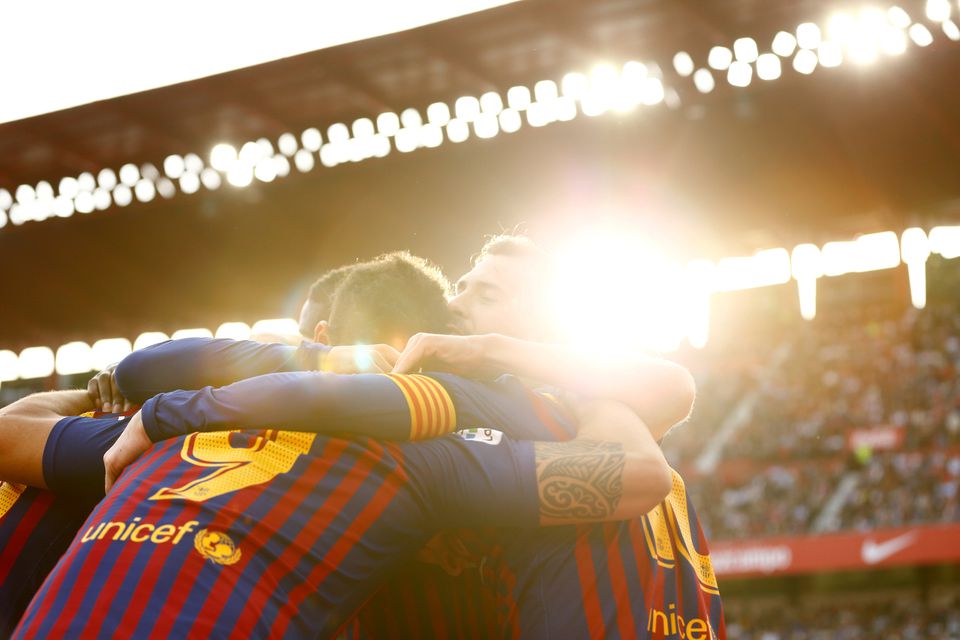 Soccer Football - La Liga Santander - Sevilla v FC Barcelona - Ramon Sanchez Pizjuan, Seville, Spain - February 23, 2019 Barcelona's Lionel Messi celebrates with team mates after scoring their third goal to complete his hat-trick. Photo: Reuters