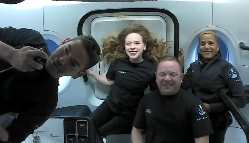 Inspiration4 crew Jared Isaacman, Sian Proctor, Hayley Arceneaux, and Chris Sembroski, seen on their first day in space in this handout photo released on September 17, 2021. Photo: SpaceX/Handout via Reuters