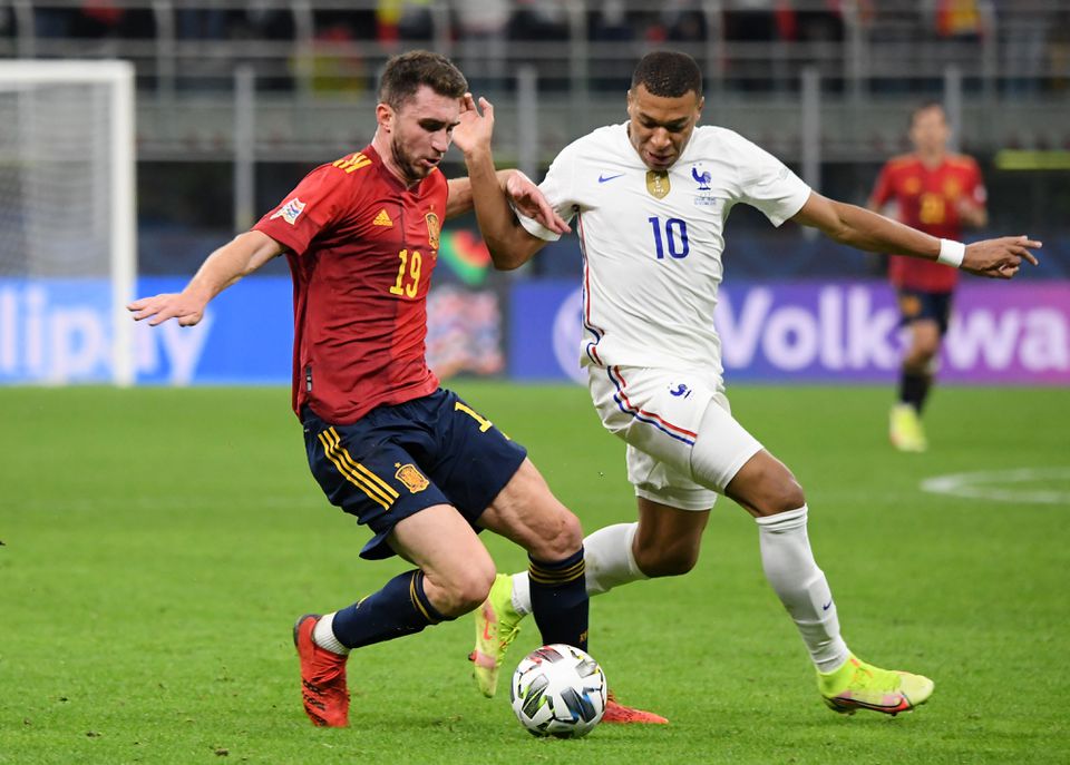 Soccer Football - Nations League - Final - Spain v France - San Siro, Milan, Italy - October 10, 2021 Spain's Aymeric Laporte in action with France's Kylian Mbappe. Photo: Reuters