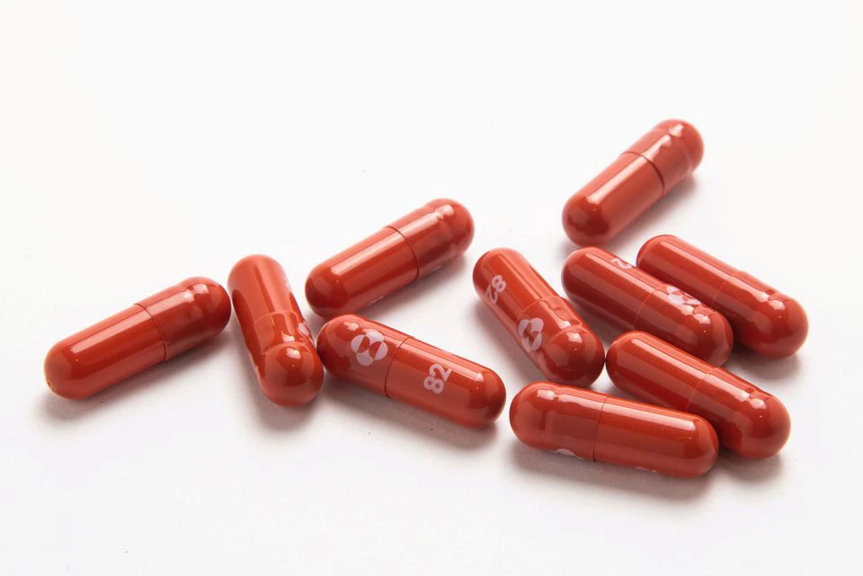 An experimental COVID-19 treatment pill, called molnupiravir and being developed by Merck & Co Inc and Ridgeback Biotherapeutics LP, is seen in this undated handout photo released by Merck & Co Inc and obtained by Reuters on October 26, 2021. Merck & Co Inc/Handout via Reuters
