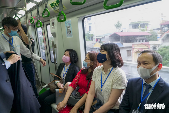Passengers on the first trip leaving Cat Linh station after the handover ceremony on November 6, 2021. Photo: Pham Tuan / Tuoi Tre