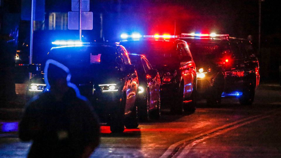 Police and emergency responders gather after a vehicle plowed through the Christmas Parade, leaving multiple people injured in Waukesha, Wisconsin, U.S. November 21, 2021. Photo: Scott Ash-USA TODAY NETWORK via REUTERS