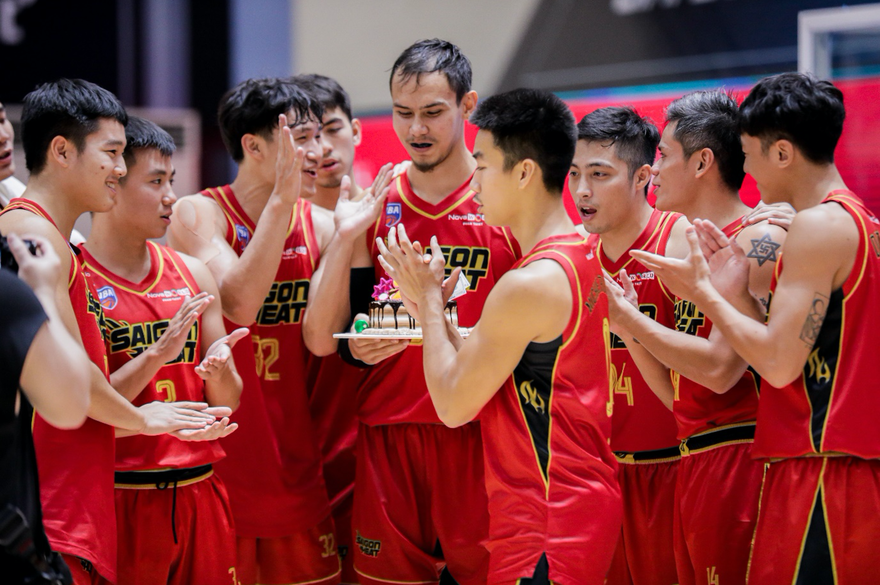Teammates celebrate the birthday of a Saigon Heat player following a game at the VBA Premier Bubble Games 2021. Photo: VBA