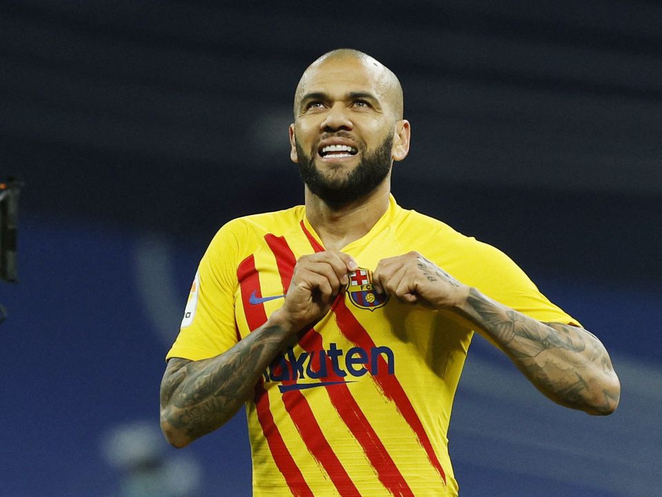 Soccer Football - LaLiga - Real Madrid v FC Barcelona - Santiago Bernabeu, Madrid, Spain - March 20, 2022 FC Barcelona's Dani Alves celebrates after the match. Photo: Reuters