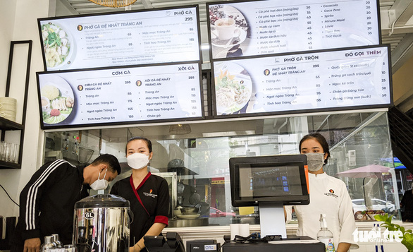 Pho with prices from VND45,000 ($1.98) to VND155,000 ($6.82) are seen on the menu in this photo. Photo: Tan Luc / Tuoi Tre