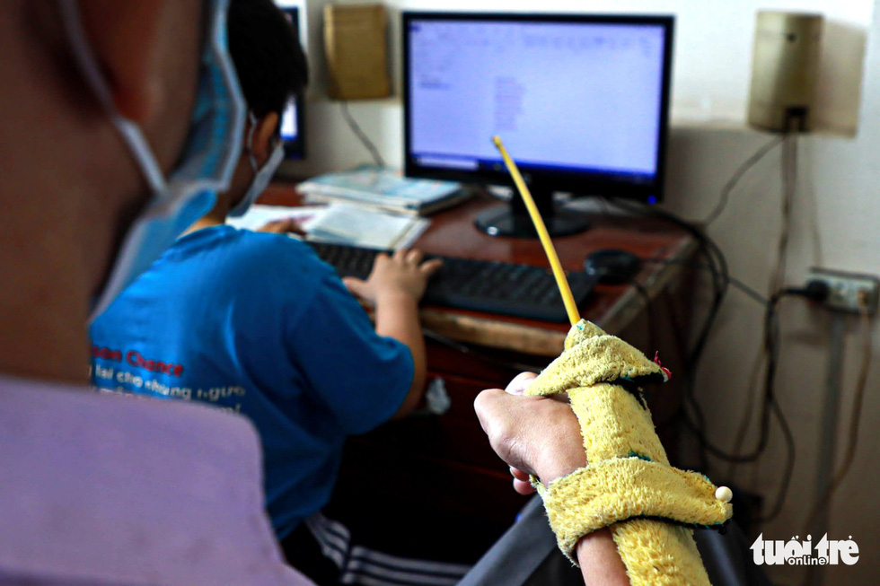 A special ruler that Nguyen Ngoc Lam uses to teach his students.