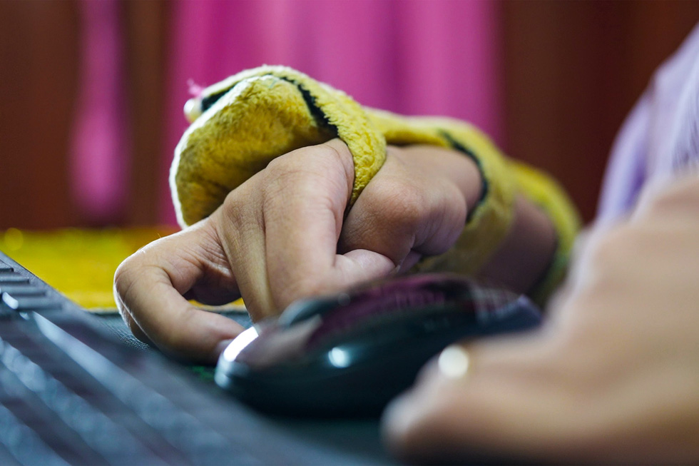 Nguyen Ngoc Lam is practicing typing.
