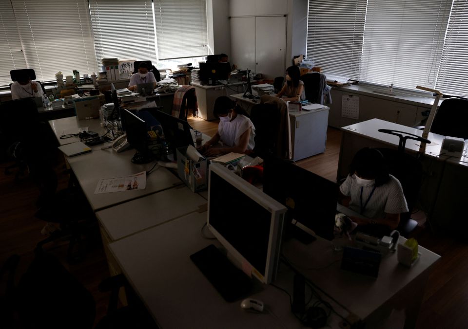 The interior of Ministry of Economy, Trade and Industry (METI) building is dimly lit to save electricity during daytime as Japanese government issues warning over possible power crunch in Tokyo, Japan June 27, 2022. Photo: Reuters