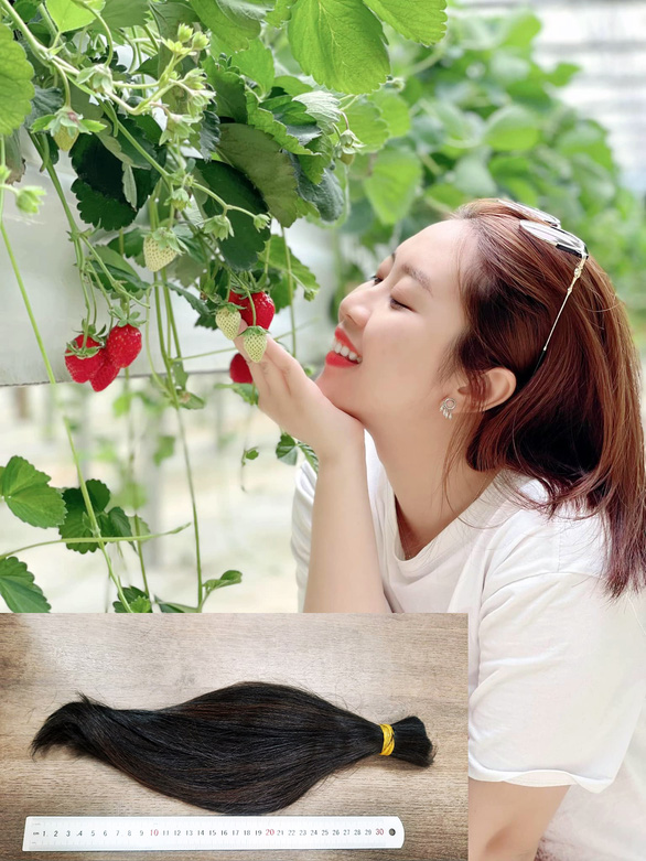 Phan Vu Thu Trang looks beautiful with her new hairstyle after donating her long hair to cancer patients.