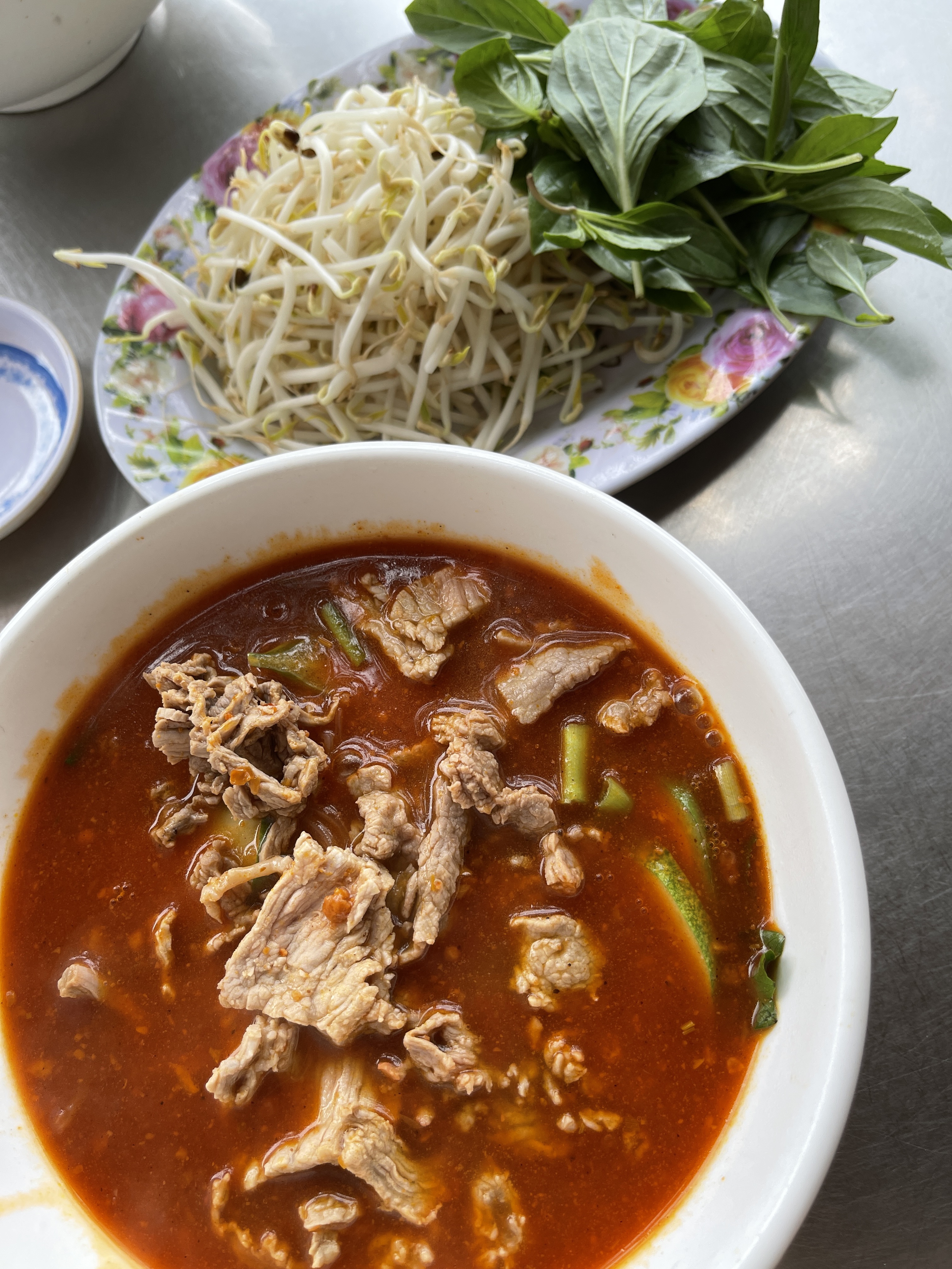 A bowl of 'hu tieu sa te' is served at a stall in My Tho City, Tien Giang Province, Vietnam. Photo: Dong Nguyen / Tuoi Tre News