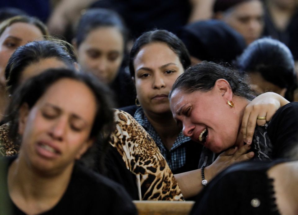 People react during the funeral of victims, who died due to the fire that broke out at the Abu Sifin church, inside the Church of the Blessed Virgin Mary at Warraq Al Arab district in Giza Governorate, Egypt, August 14, 2022. Photo: Reuters