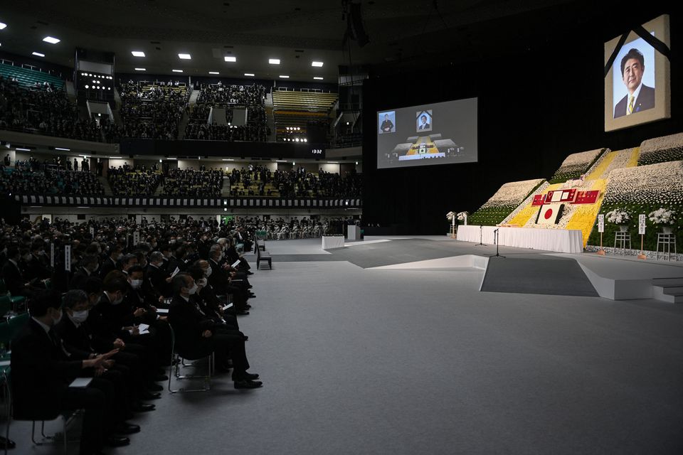 Guests wait for the start of the state funeral of former Japanese prime minister Shinzo Abe at the Nippon Budokan in Tokyo on September 27, 2022. PHILIP FONG/Pool via Reuters