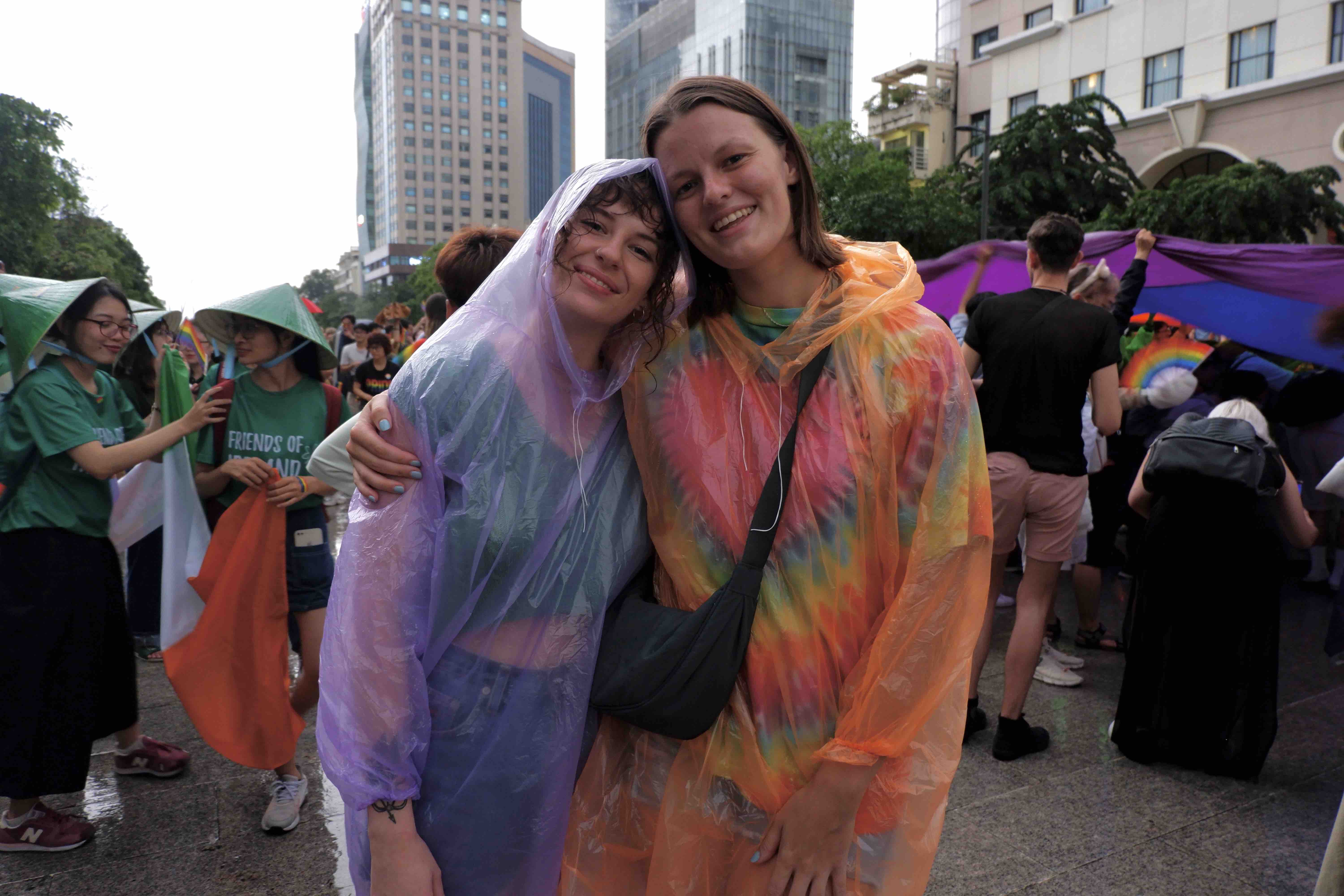 A couple poses for a photo at VietPride 2022 parade in Ho Chi Minh City on October 1, 2022. Photo: Linh To / Tuoi Tre News