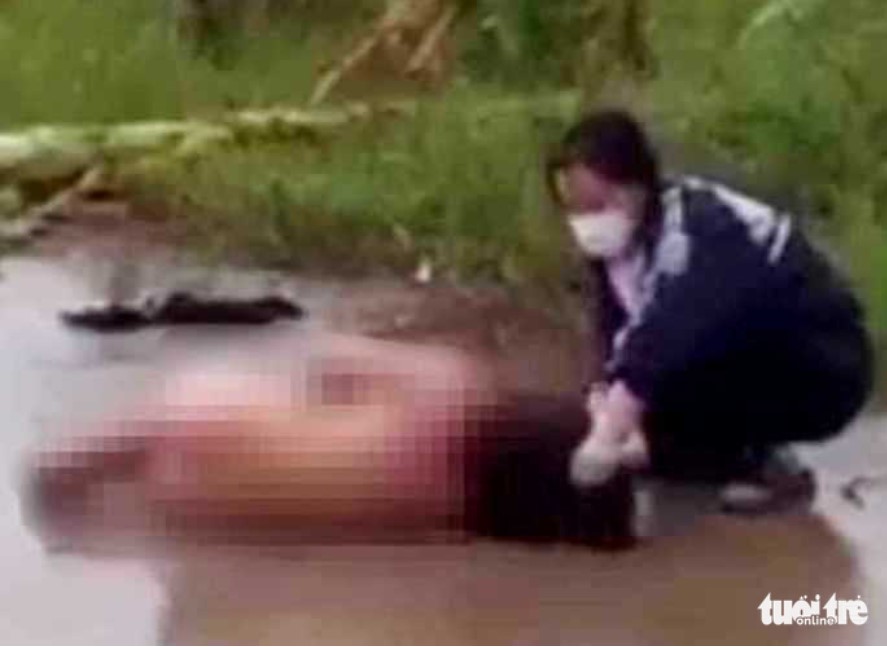 A student is beaten and humiliated by her schoolmates. This screenshot is from a clip that recently went viral on the Internet.