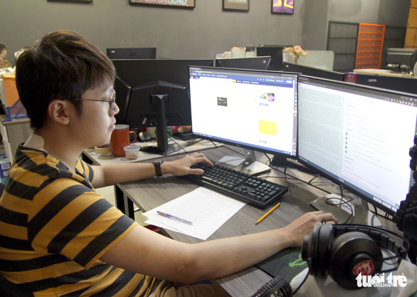Tran Cong Dang Khoa practices for his IELTS test in Ho Chi Minh City, Vietnam. Photo: Phuong Quyen / Tuoi Tre