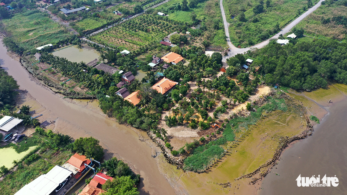 A bird’s-eye view of a newly-formed plot blocking the flow of the Rach Dia River in Nha Be District, Ho Chi Minh City. Photo: Tu Trung / Tuoi Tre