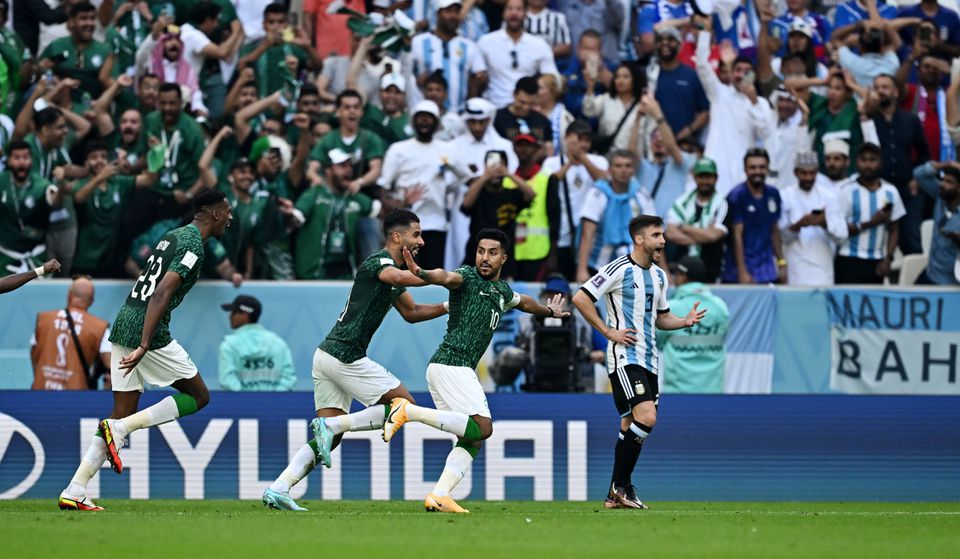 Soccer Football - FIFA World Cup Qatar 2022 - Group C - Argentina v Saudi Arabia - Lusail Stadium, Lusail, Qatar - November 22, 2022 Saudi Arabia's Salem Al-Dawsari celebrates scoring their second goal with teammates. Photo: Reuters