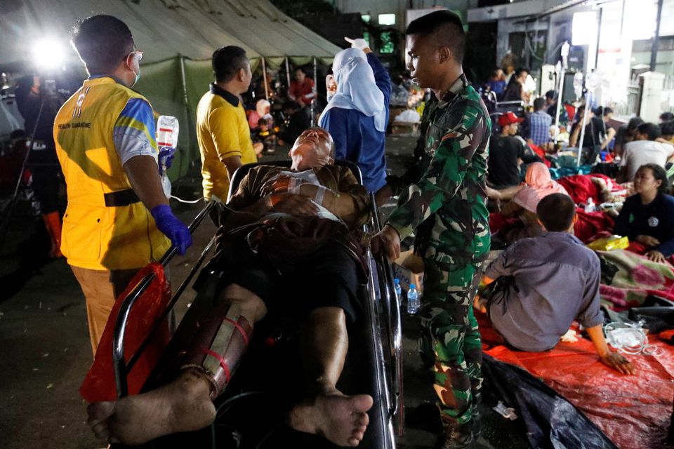A man injured in an earthquake receives treatment at a hospital in Cianjur, West Java province, Indonesia, November 21, 2022. Photo: Reuters