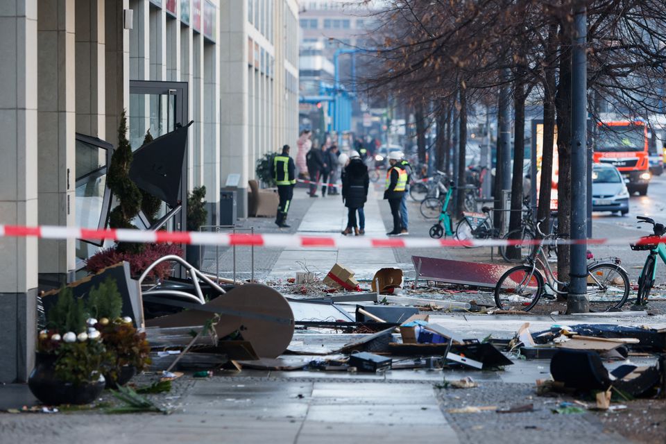 A view of debris on the street outside a hotel after a burst and leak of the AquaDom aquarium in central Berlin near Alexanderplatz, in Berlin, Germany, December 16, 2022. Photo: Reuters