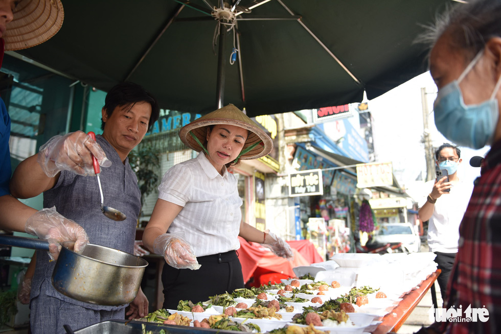 Lunch boxes are prepared by the married couple.