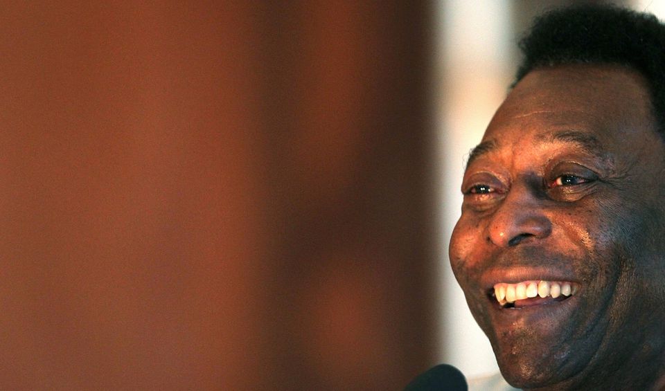 Brazilian soccer legend and honorary ambassador for the 2014 World Cup Pele smiles during a news conference ahead of the preliminary draw in Rio de Janeiro, Brazil, July 29, 2011. REUTERS/Sergio Moraes