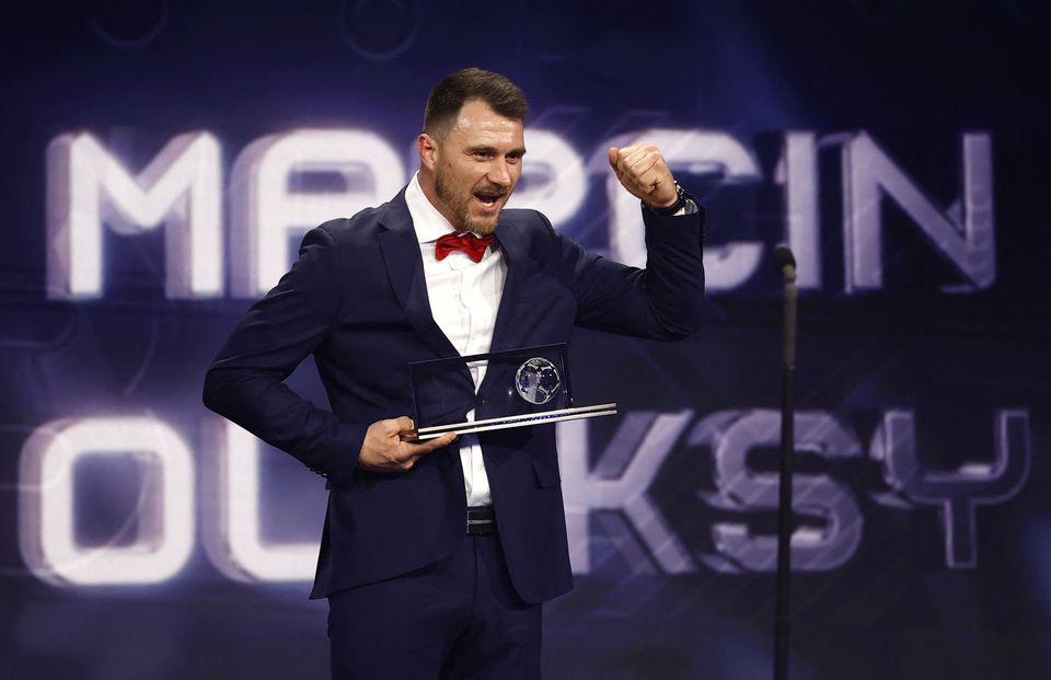 Soccer Football - The Best FIFA Football Awards - Salle Pleyel, Paris, France - February 27, 2023 Marcin Oleksy receiving the Puskas Award during the Best FIFA Football Awards. Photo: Reuters