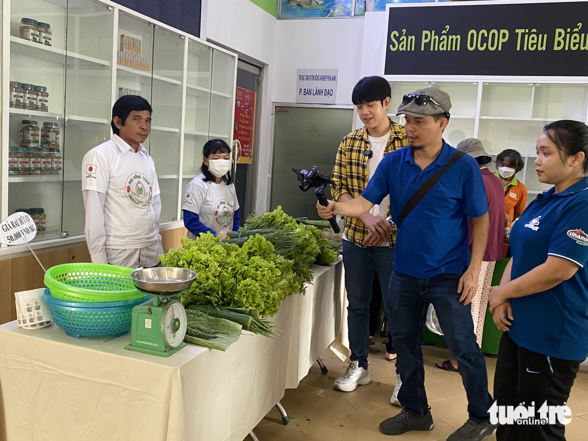 A photo shows farmers selling organic vegetables