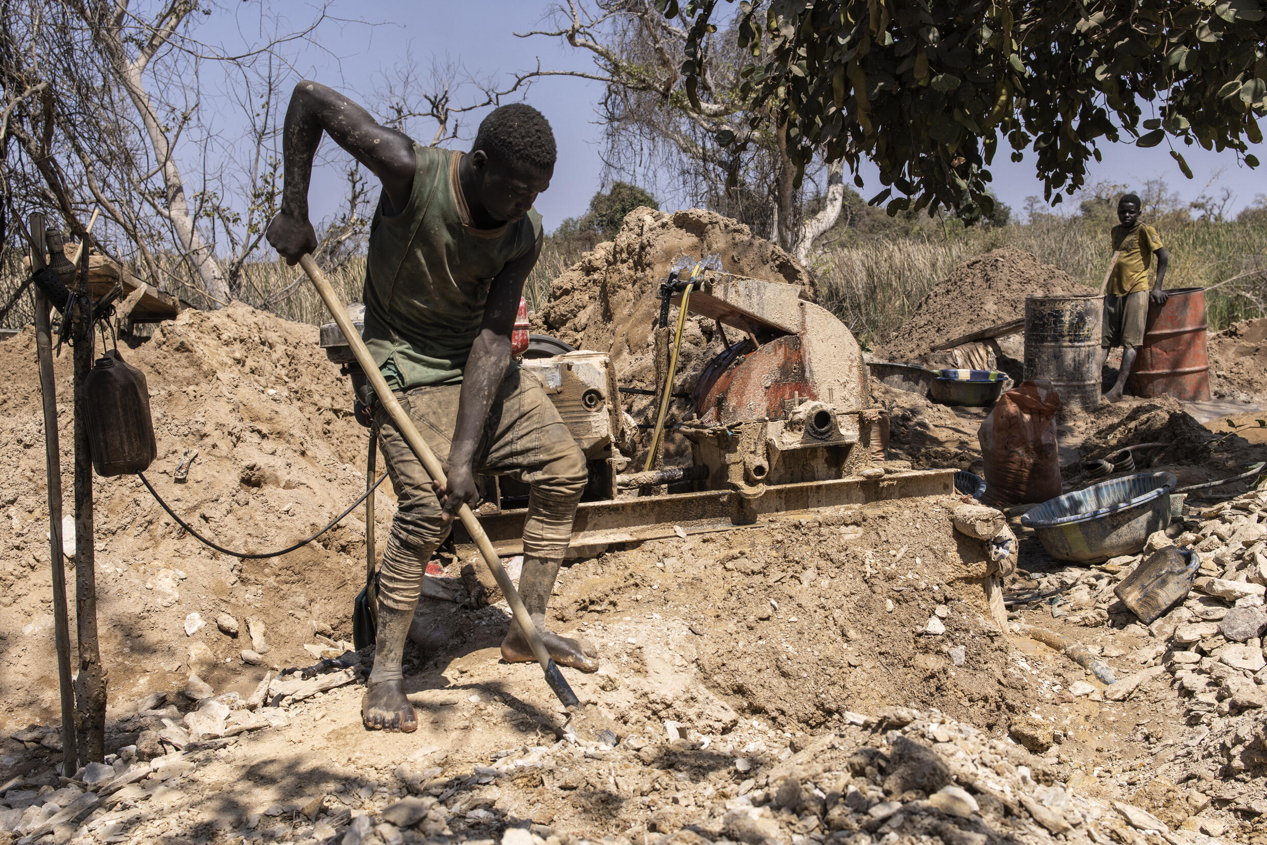An artisanal gold miner digs at the Bantakokouta gold mine on February 2, 2023. Photo: AFP