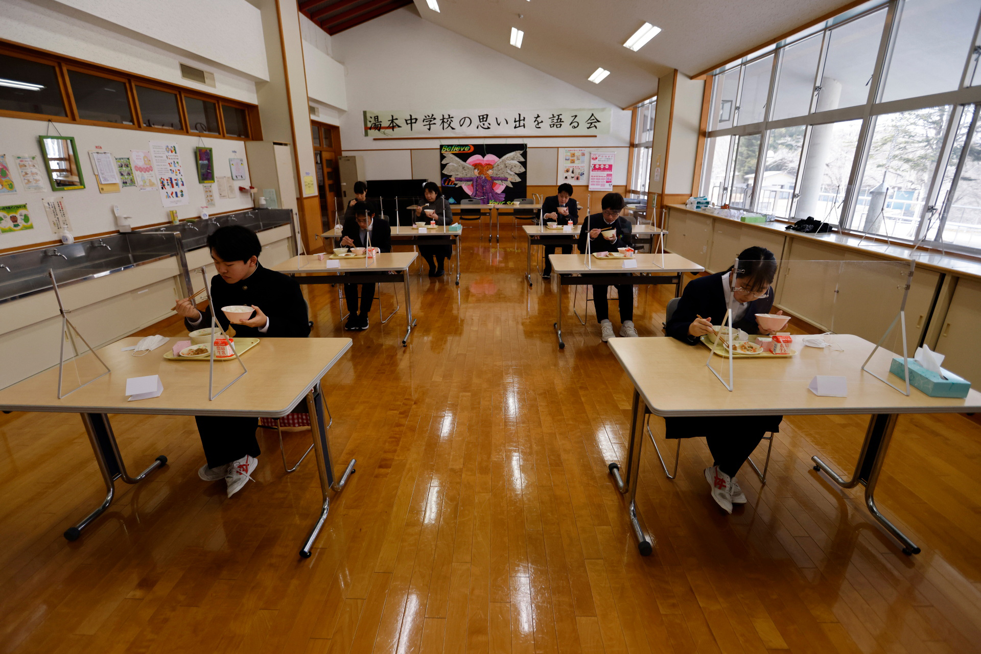 Eita and Aoi have their last school lunch with their teachers a few days before graduation and the school’s closing ceremony, in Ten-ei Village, Japan, March 9, 2023. Photo: Reuters