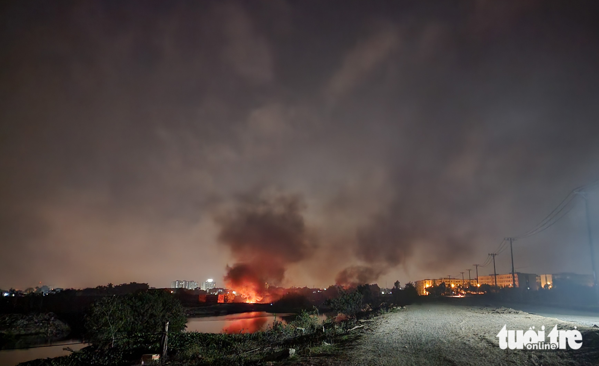 Smoke is produced by garbage burning in Binh Chanh District, Ho Chi Minh City. Photo: Tuoi Tre