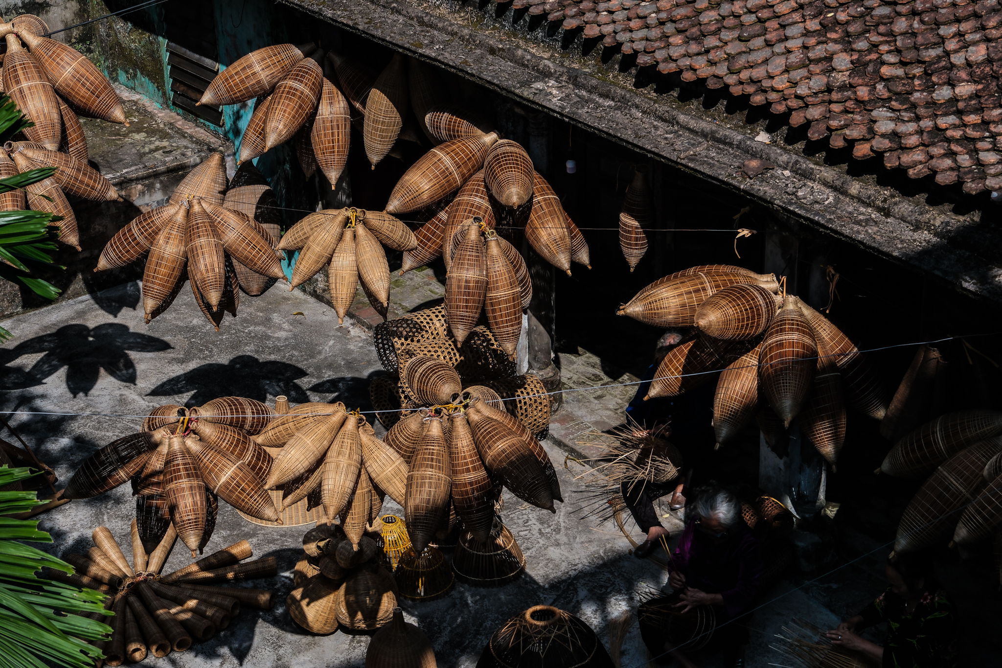 A courtyard full of bamboo fishing traps at Thu Sy craft village in Thu Sy Commune, Hung Yen Province, Vietnam. Photo: Nam Tran / Tuoi Tre News