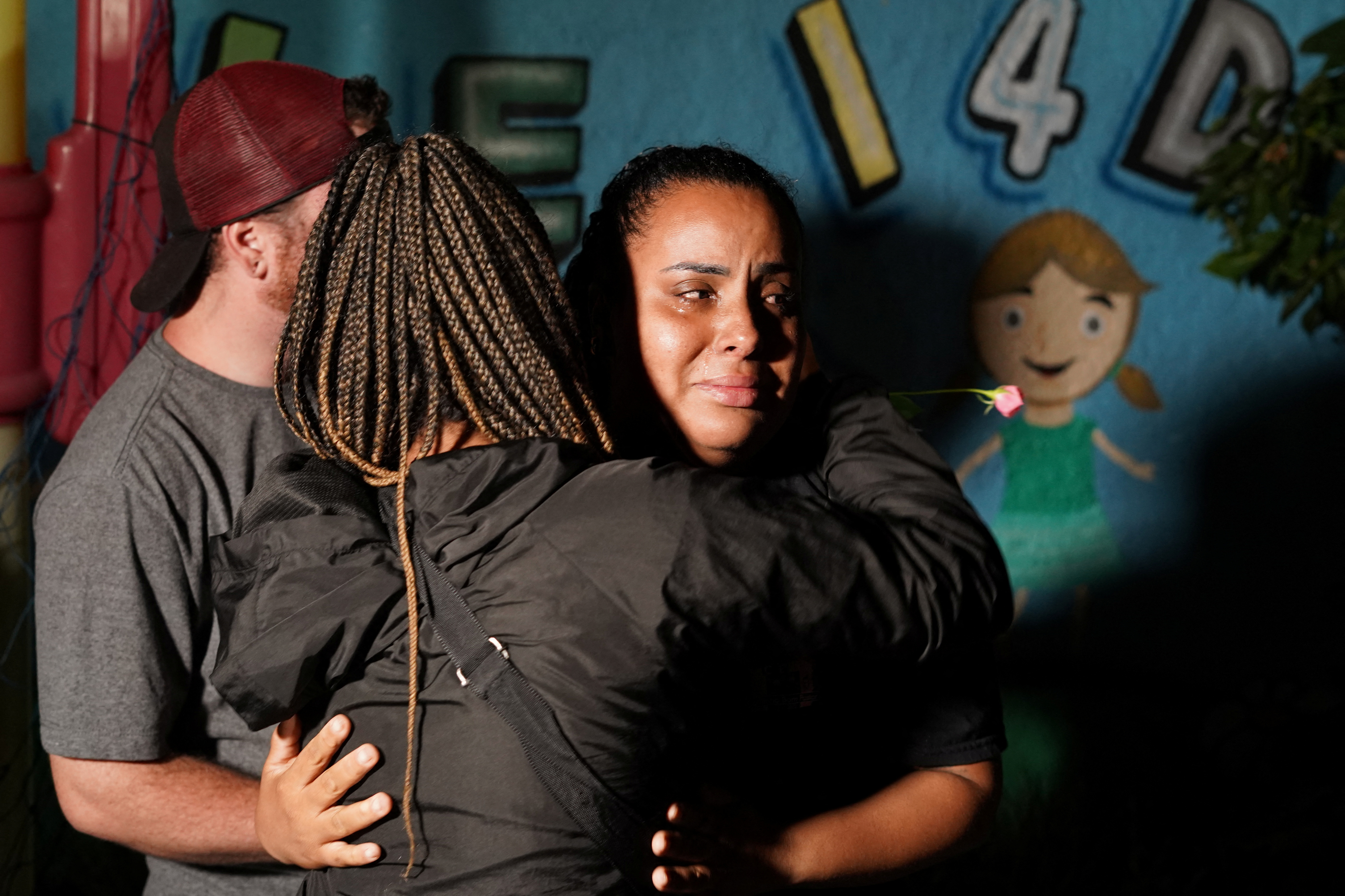 A woman cries during a tribute to victims of a fatal attack at the Cantinho do Bom Pastor daycare center, in Blumenau, Santa Catarina, Brazil April 5, 2023. Photo: Reuters