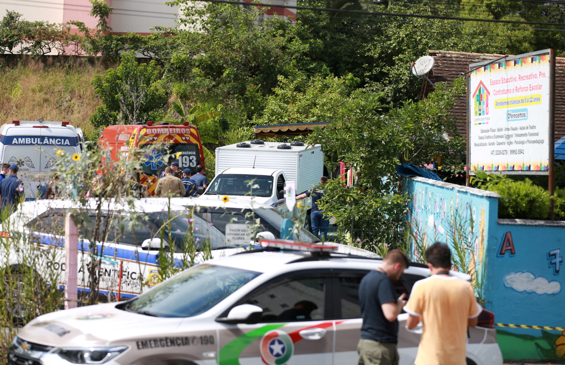 view shows forensic technicians, ambulances and policemen outside a pre-school after a 25-year-old man attacked children, killing several and injuring others, according to local police and hospital, in Blumenau, in the southern Brazilian state of Santa Catarina, Brazil April 5, 2023. Photo: Reuters
