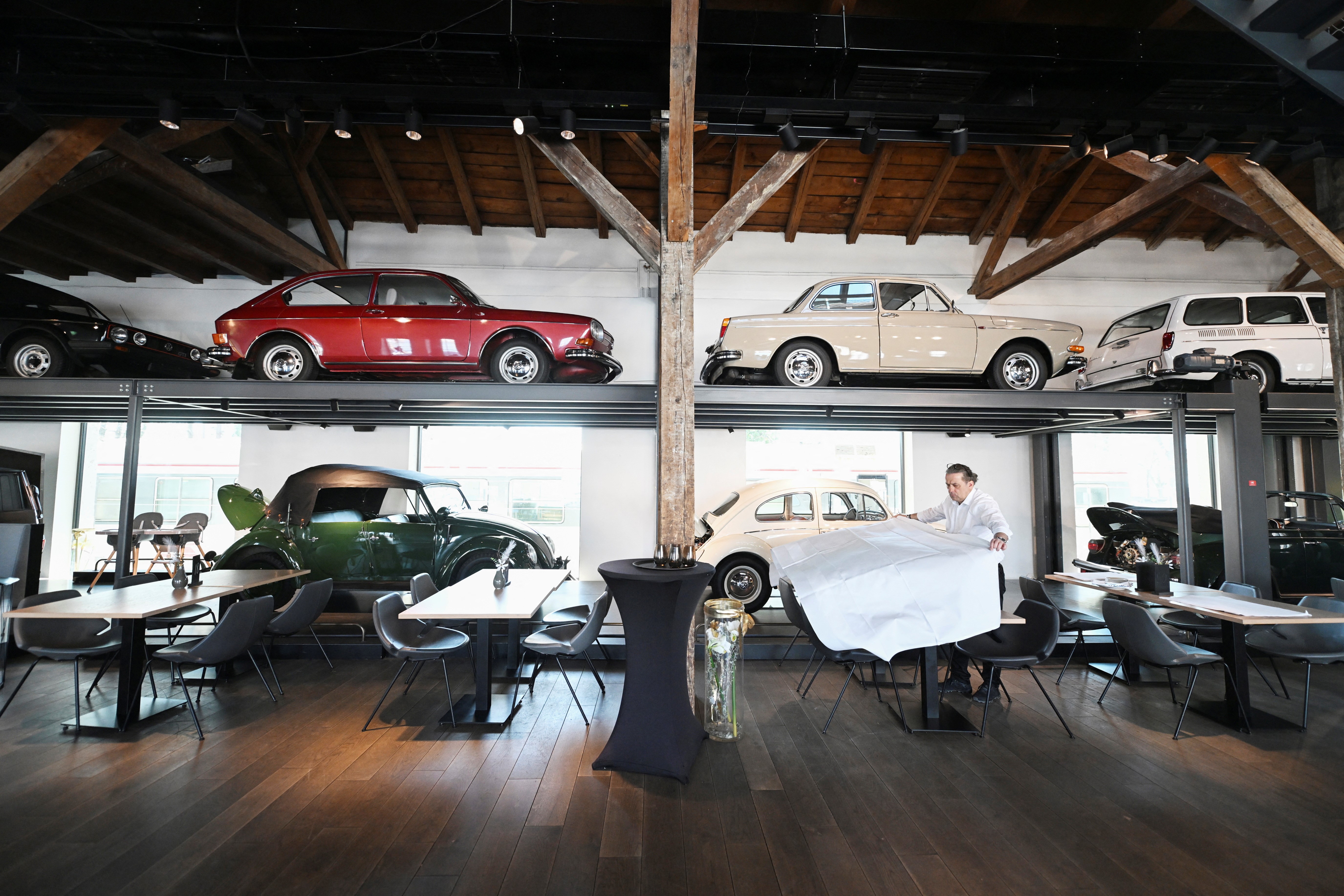 Vintage cars, of Florian Zimmermann owner of a collection over 300 classic cars, are on display in his Restaurant in Lindau, Germany, April 5, 2023. Photo: Reuters