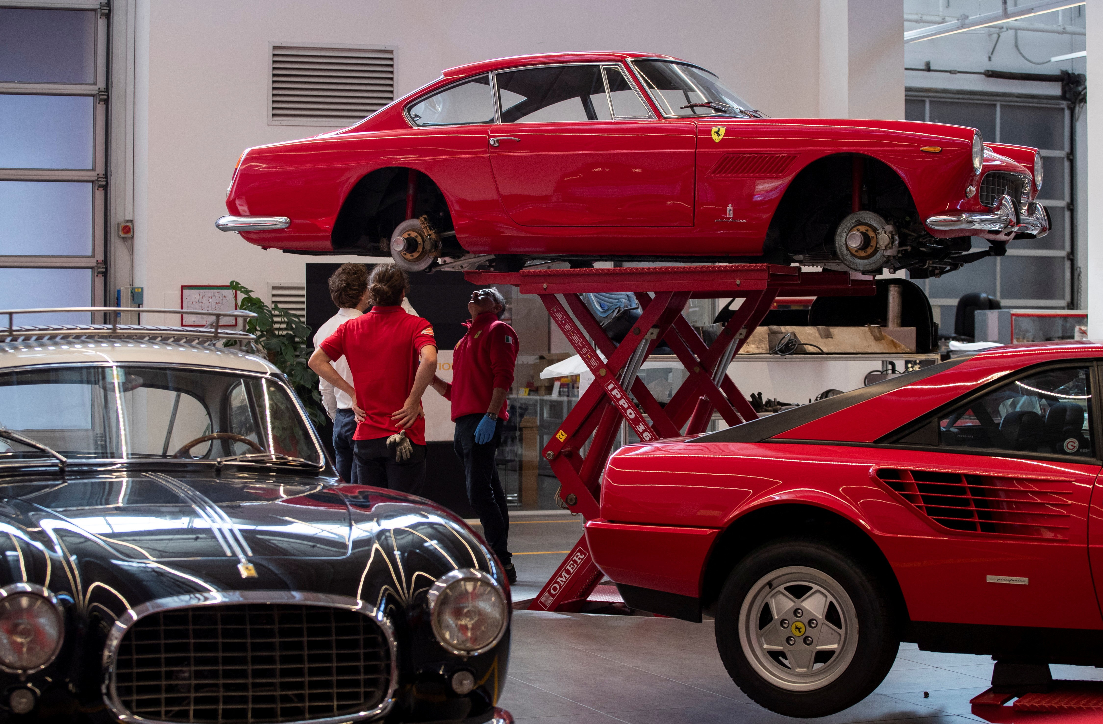 Ferrari Classiche cars are pictured in a garage at the Ferrari factory in Maranello, Italy, April 6, 2023. Photo: Reuters