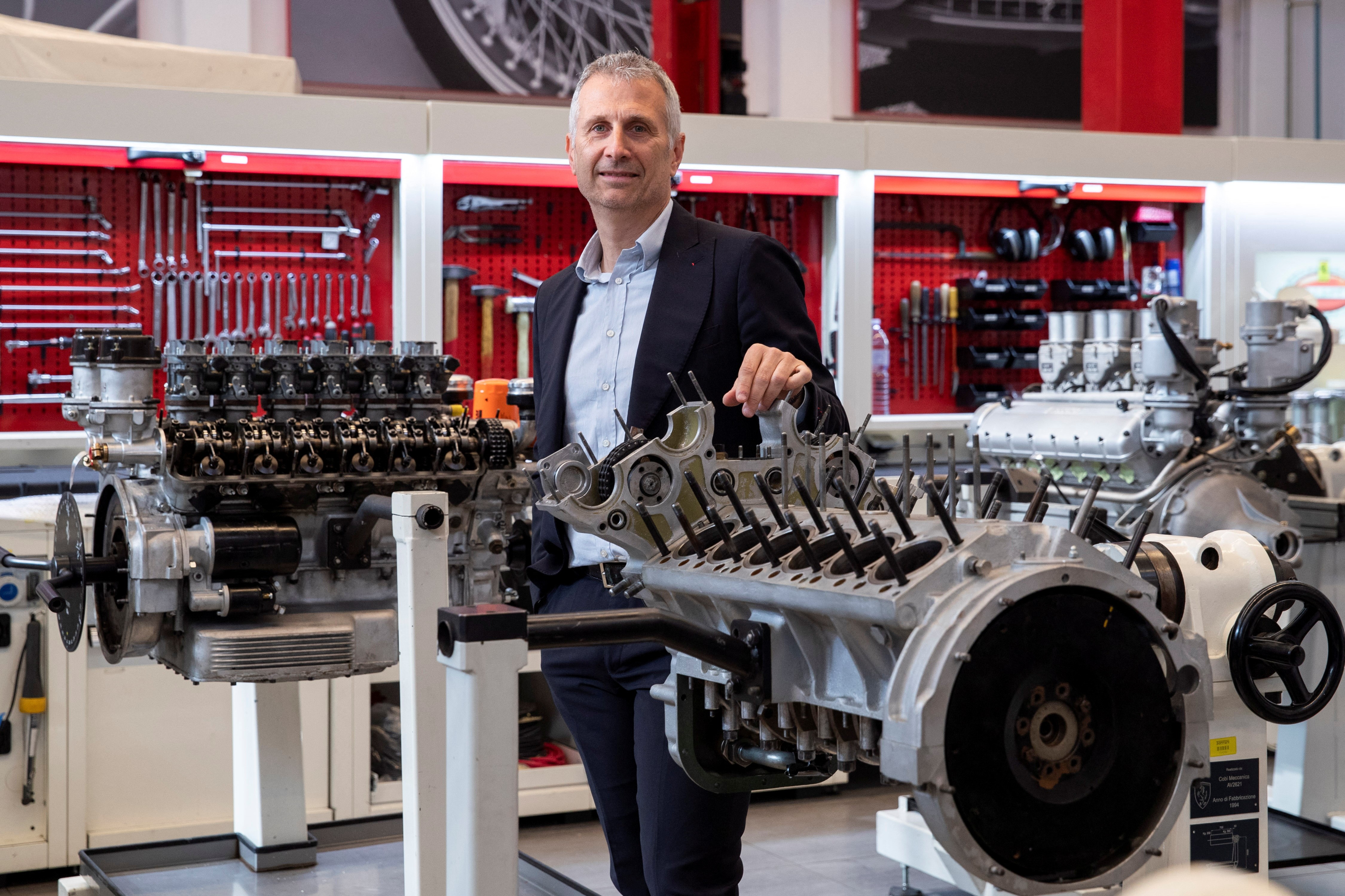 Andrea Modena, head of Global Technical Assistance Service and Ferrari Classiche, poses for a picture in a garage at the Ferrari factory in Maranello, Italy, April 6, 2023. Photo: Reuters