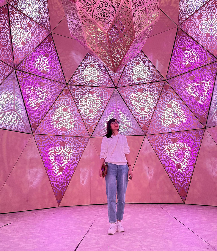 A woman explores Lumiere Da Lat Light Garden in Da Lat City, Lam Dong Province. Photo: M.V. / Tuoi Tre
