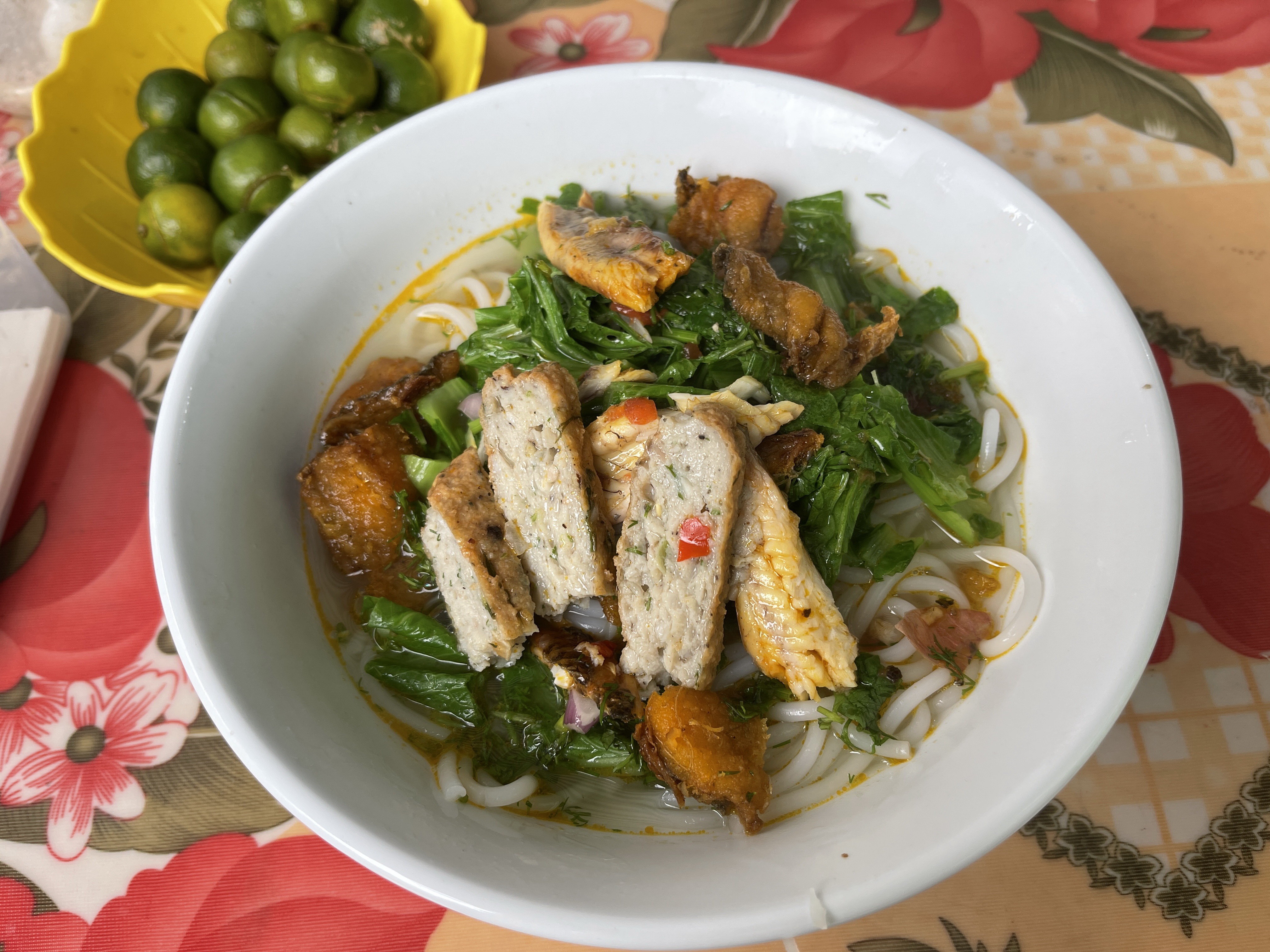 A bowl of bún cá (fish noodles) is served at a stall in the northern province of Nam Dinh. Photo: Dong Nguyen / Tuoi Tre News