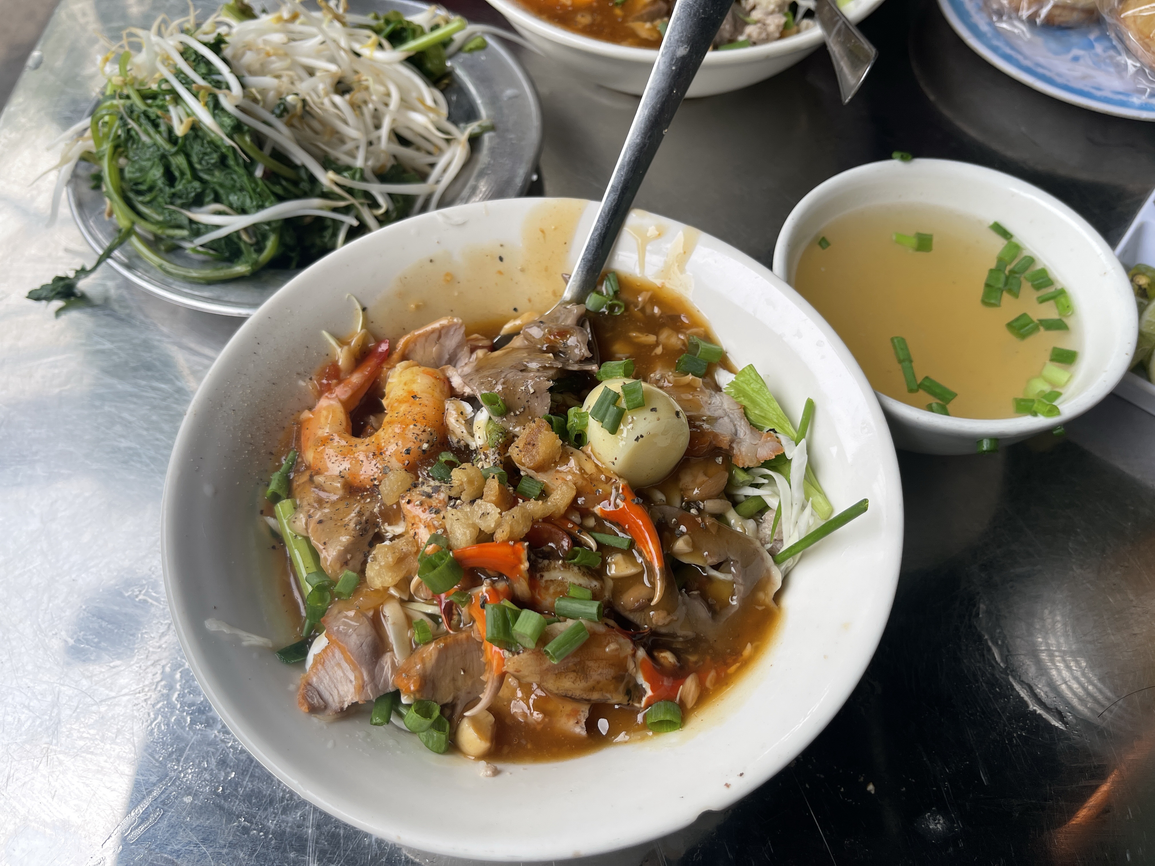 A bowl of hủ tiếu noodles is served at a stall in District 1, Ho Chi Minh City. Photo: Dong Nguyen / Tuoi Tre News