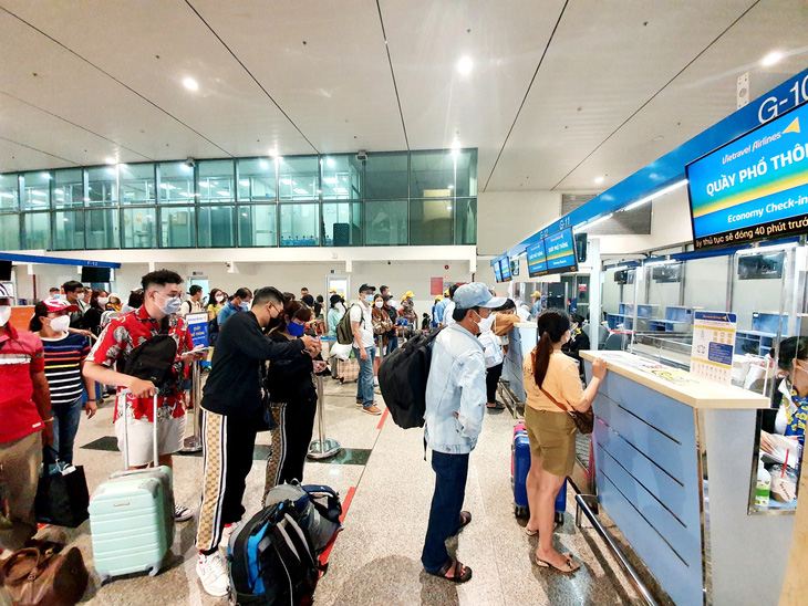 Passengers complete procedures to board aircraft.