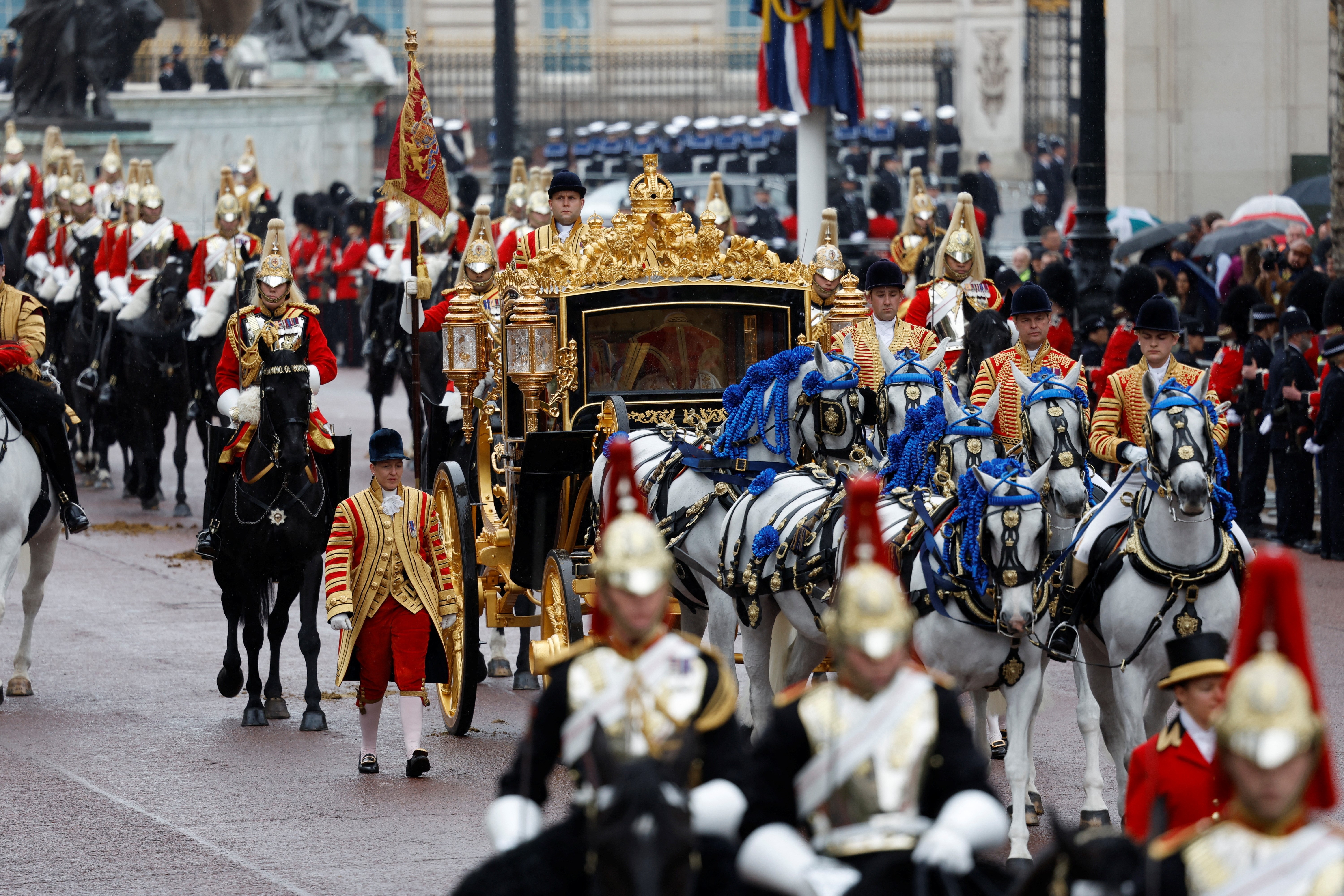 The coronation procession of King Charles III and Britain's Queen Camilla makes it's way down The Mall to Westminster Abbey, in London, Britain May 6, 2023. Photo: Reuters