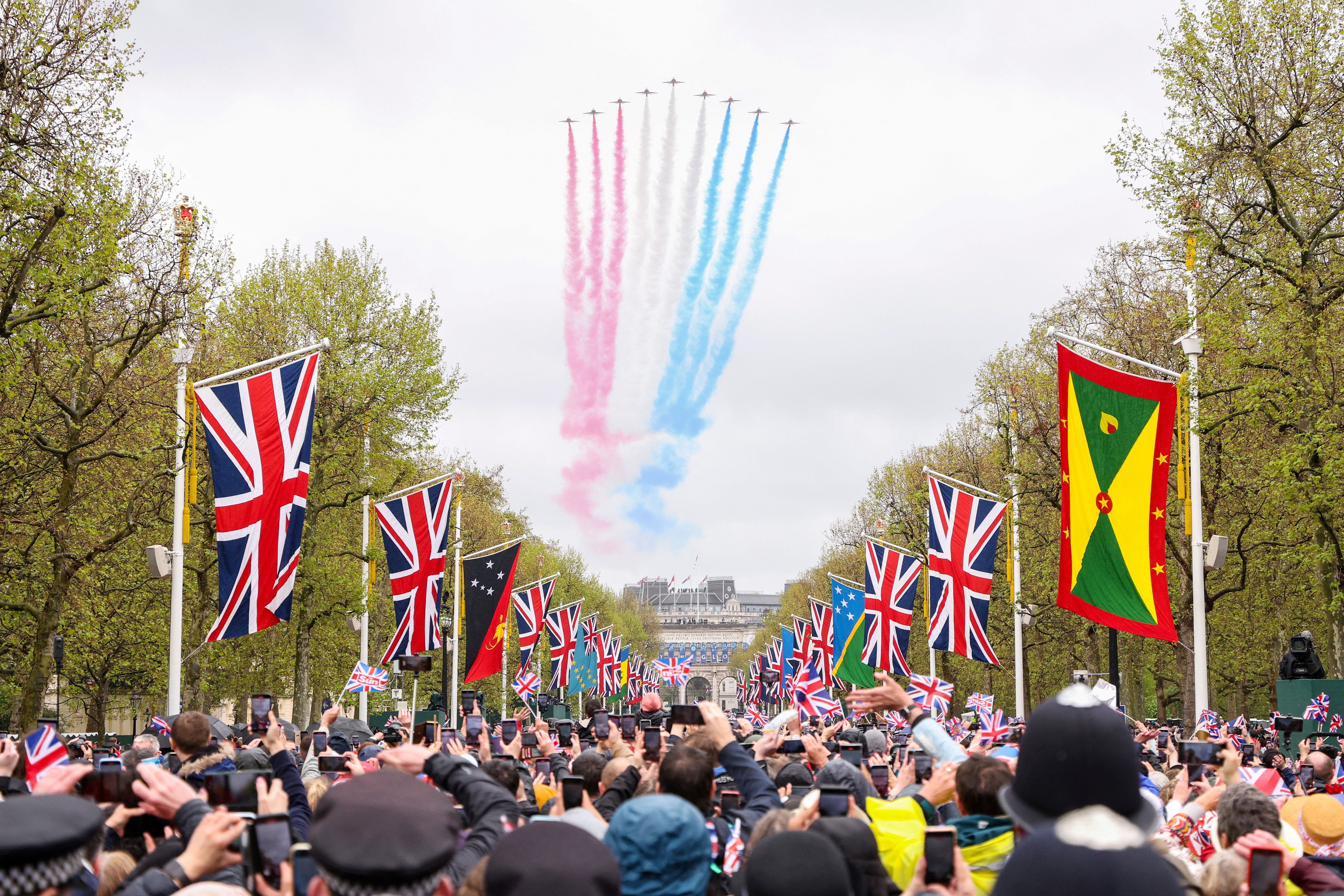 The Royal Air Force Aerobatic Team otherwise known as The Red Arrows fly down The Mall and over Buckingham Palace during the Coronation of King Charles III and Queen Camilla on May 06, 2023 in London, England. Photo: Reuters