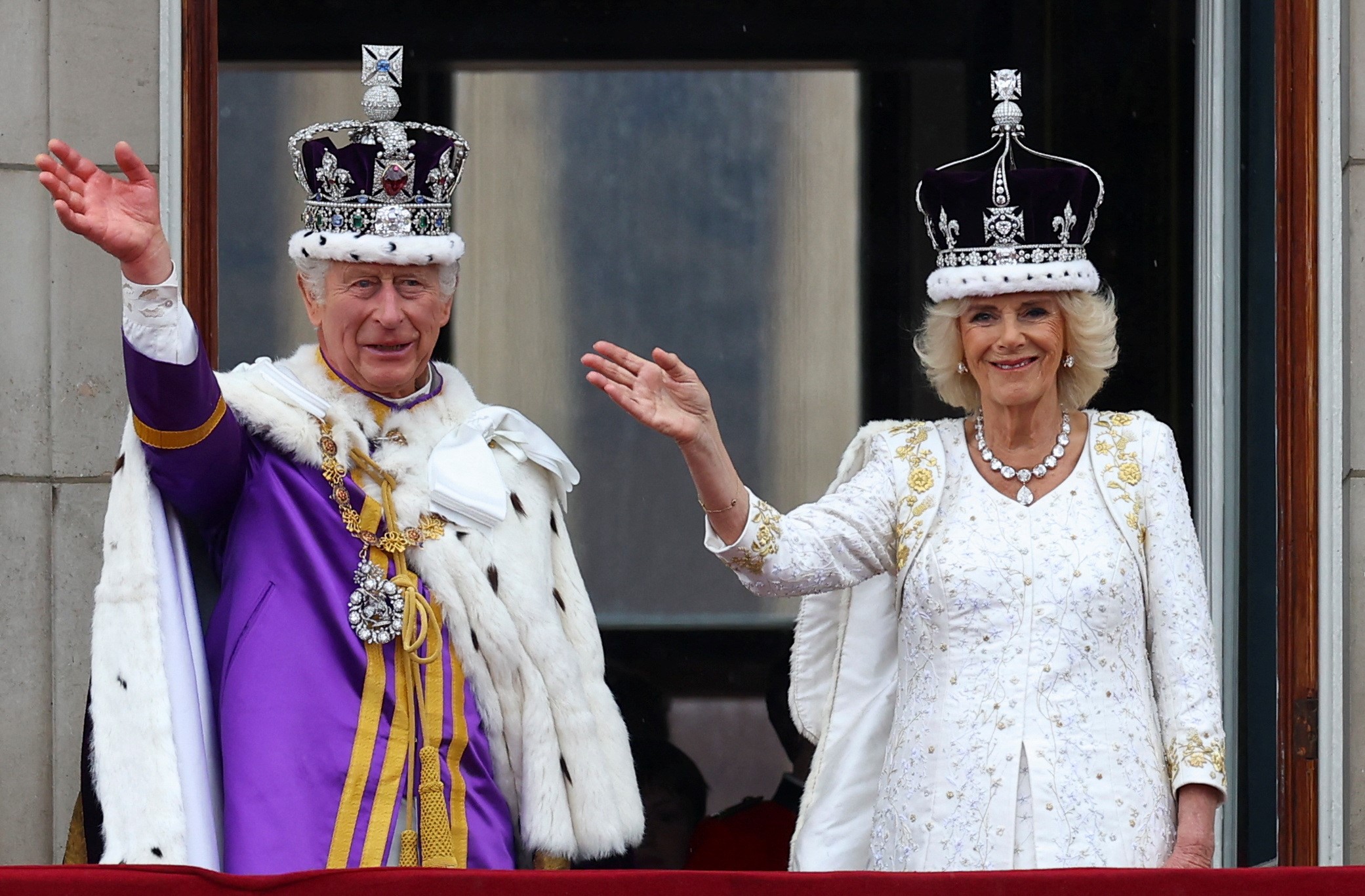 Britain's King Charles and Queen Camilla wave on the Buckingham Palace balcony following their coronation ceremony in London, Britain May 6, 2023. Photo: Reuters