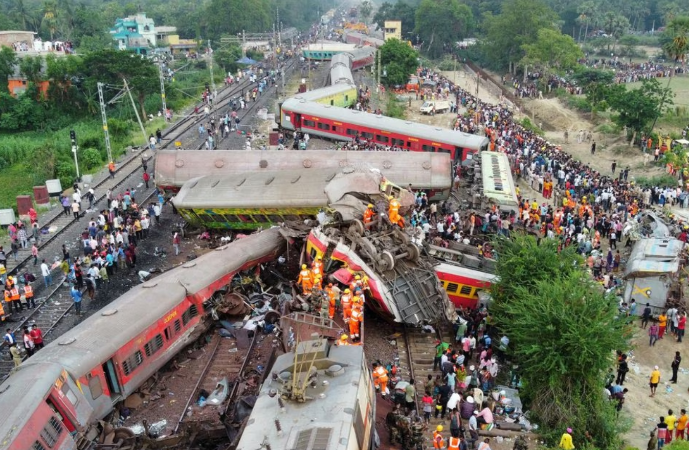 A passenger train hit a stationary freight train, went off the tracks and hit another passenger train passing in the opposite direction near the district of Balasore in the eastern state of Odisha, killing at least 275 people on June 2, 2023. Photo: Reuters