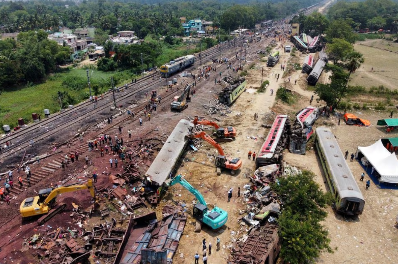 A passenger train hit a stationary freight train, went off the tracks and hit another passenger train passing in the opposite direction near the district of Balasore in the eastern state of Odisha, killing at least 275 people on June 2, 2023. Photo: Reuters