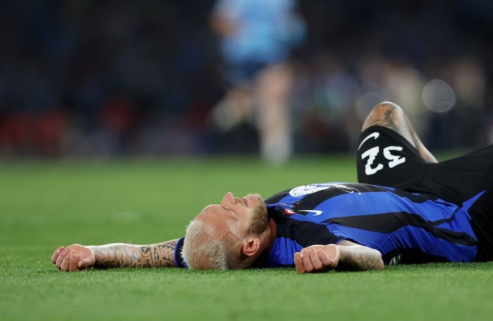Soccer Football - Champions League Final - Manchester City v Inter Milan - Ataturk Olympic Stadium, Istanbul, Turkey - June 10, 2023 Inter Milan's Federico Dimarco reacts after losing the champions league final. Photo: Reuters