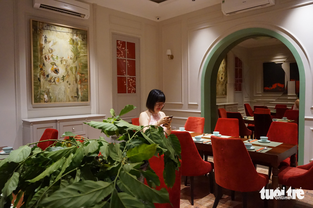 The dining room is decorated with many paintings at Ngon Garden. Photo: T.Dieu