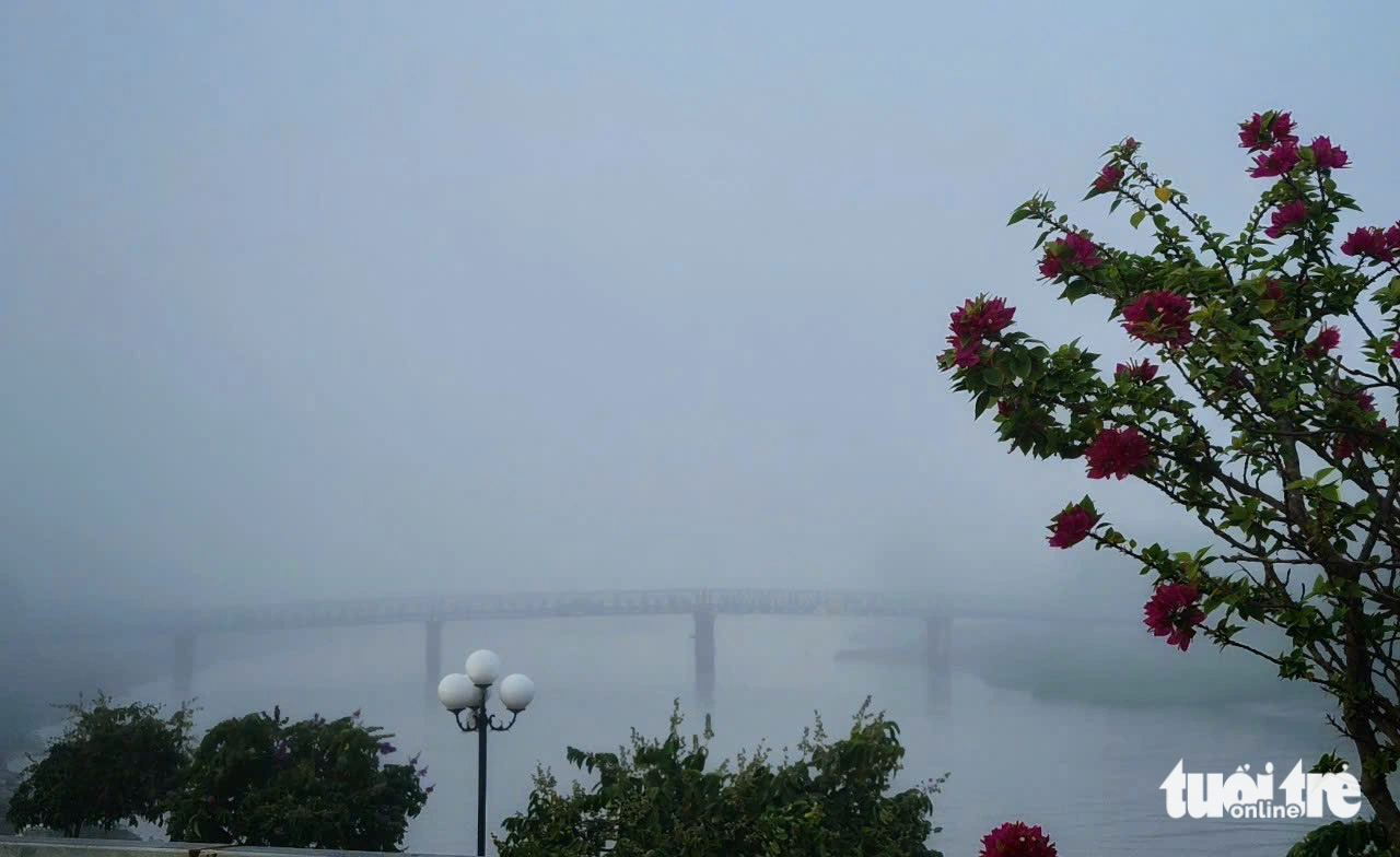 Le Hong Phong Bridge in Long Xuyen City, An Giang Province, southern Vietnam, is obscured by fog on June 26, 2023. Photo: Buu Dau / Tuoi Tre